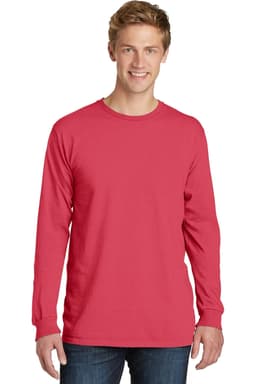 A man is wearing a red long sleeve tee. The shirt features a logo on the front.