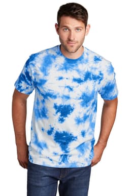 A man is wearing a blue and white tie-dye T-shirt. The shirt features a logo on the front.