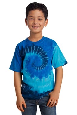 A youth tie-dye tee in shades of blue featuring a spiral design, worn by a smiling boy. The shirt includes a logo.