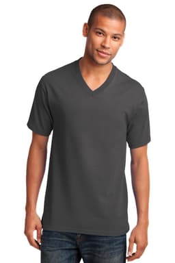 A man wearing a dark grey v-neck t-shirt, standing against a plain background. The shirt features a logo.