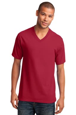 A man wearing a red Port & Company Core Cotton V-Neck Tee, featuring short sleeves and a branding logo.