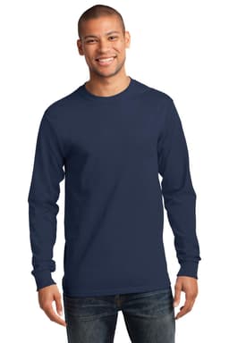 A man wearing a navy long sleeve essential tee. The shirt features a logo and is paired with jeans.