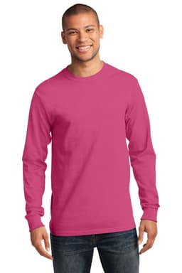 A man is wearing a long sleeve essential tee in vibrant pink, featuring a logo and styled with jeans.