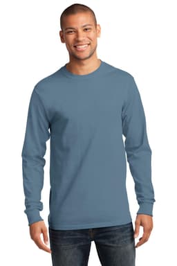 A long sleeve t-shirt in a blue hue, featuring a crew neck and a solid design. The model is wearing jeans.
