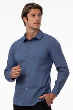 A men's shirt in black with a fitted design, featuring a collar and long sleeves. The model is posing in a neutral background.