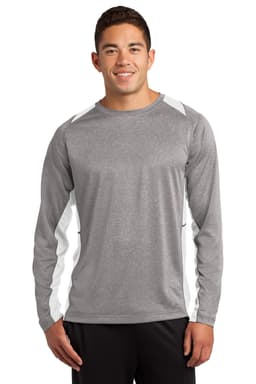 A man in a grey long sleeve T-shirt with white colourblock accents, featuring a logo on the shirt.