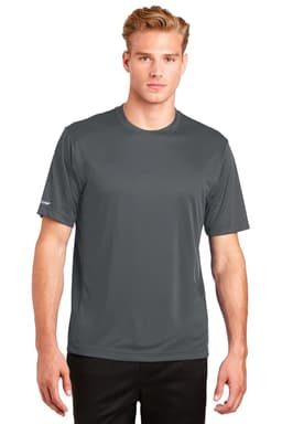 A grey Sport-Tek PosiCharge Elevate Tee featuring a logo, displayed by a model wearing black pants.