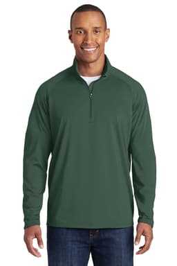 A man is wearing a dark green Sport-Tek Sport-Wick Stretch 1/2-Zip Pullover, featuring long sleeves and a quarter zip.
