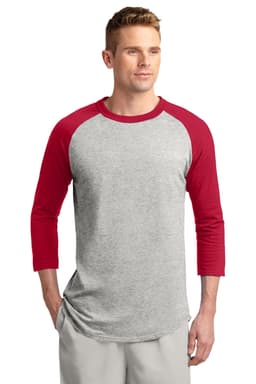A grey and red Sport-Tek Colorblock Raglan Jersey with three-quarter sleeves worn by a model. Features a logo.