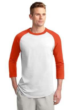 A man models a Sport-Tek Colourblock Raglan Jersey with white body and orange sleeves, featuring a logo on the chest.