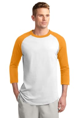 A man wearing a Sport-Tek Colourblock Raglan Jersey with white body and orange sleeves, featuring a logo.
