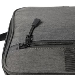 A grey cooler bag featuring a zippered closure and textured fabric. It includes a logo.