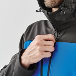 A men's hooded softshell jacket in black and blue, featuring a zippered front and adjustable hood.