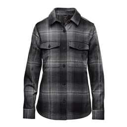 A women's shacket in a black and grey highland plaid pattern, featuring a button-up front and two chest pockets.