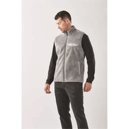A men's grey sherpa fleece vest with a front zipper and a pocket, modelled by a man.
