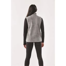 A grey women's Sherpa fleece vest with a high collar, featuring a logo, viewed from the back.