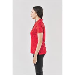 A red women's polo shirt with a textured pattern, displayed on a model in profile. It features a collar and has a logo.