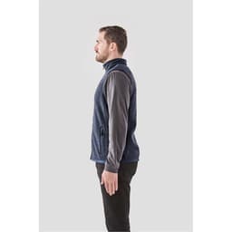 A side view of a men's navy blue fleece vest with a zippered front and one side pocket.