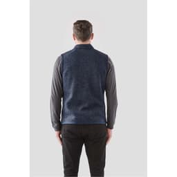 A men's full zip fleece vest in navy blue, viewed from the back, featuring a simple design and logo.