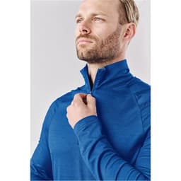 A blue men's 1/4 zip pullover featuring a high collar and long sleeves, with a logo on the chest.
