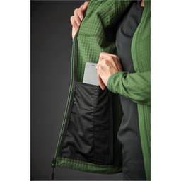 A green women's jacket with a pocket visible inside, holding a smartphone. The jacket features a textured design.