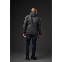 A black men's softshell jacket with a hood, shown from the back, paired with dark jeans. Features branding.