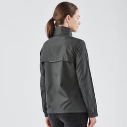 A women's rain jacket in dark grey, featuring a high collar and a flap at the back, with a logo present.