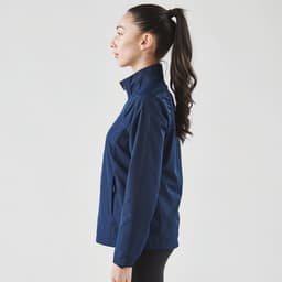 A women's navy rain jacket featuring a 1/4 zip design, with a slim fit and a high collar. It has a logo.
