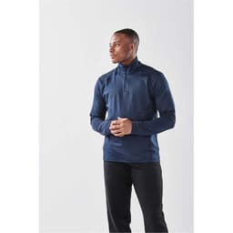 A long sleeve, navy blue quarter-zip shirt with a sleek design and fitted silhouette, featuring a logo.