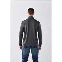 A man in a dark grey long sleeve quarter-zip shirt, viewed from the back, wearing jeans. The shirt features a logo.
