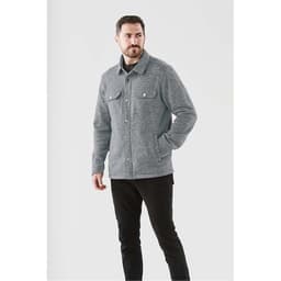 A grey unisex fleece shacket featuring a collared neck and button-down front, with two chest pockets.