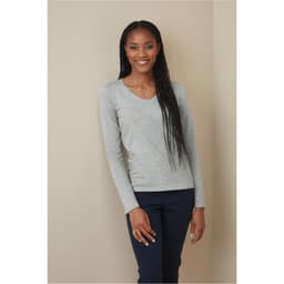 A grey long sleeve shirt with a V-neck, worn by a model with long, straight hair. Features a subtle logo.