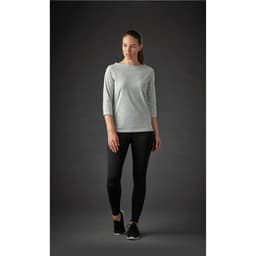 A grey women's 3/4 sleeve tee paired with black leggings, featuring a subtle logo.
