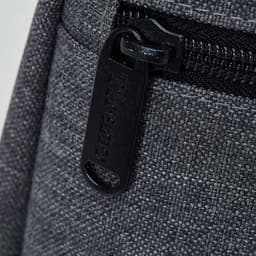 A drink bottle cooler in grey fabric, featuring a zippered compartment and a pull tab with branding.