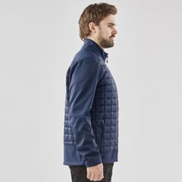 Men's thermal softshell jacket in navy, featuring a quilted design and a zipped pocket, with a branding logo.