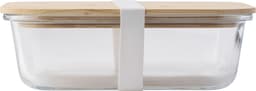 A glass lunchbox with a bamboo lid, featuring a white silicone strap for secure closure.