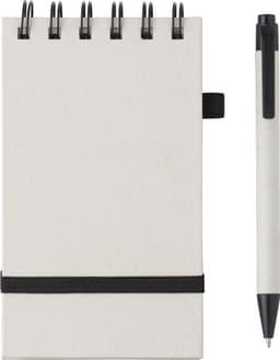 A recycled milk carton notebook in off-white with a black elastic band, accompanied by a matching pen.