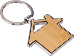 A zinc alloy key holder in a house shape with a bamboo inlay and a silver keyring.