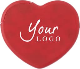 A red heart-shaped case with a logo, containing mints inside.