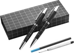 A metal writing set featuring two black pens with silver accents, placed on a grid-patterned box.