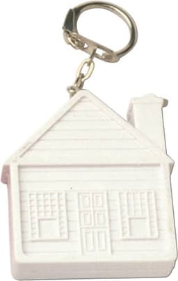A white key holder shaped like a house with a silver keyring attachment.