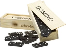 A wooden box containing a domino game with black domino pieces and a lid partially open.