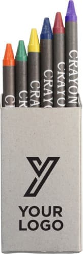 A cardboard box containing six crayons in green, yellow, red, purple, and orange, with a logo on the front.