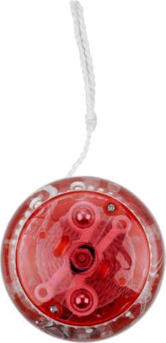 A red plastic yo-yo with a clear body and a white string attached. It has a circular shape and a smooth surface.
