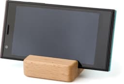 A beech wood phone holder displaying a smartphone, featuring a light wood finish and a minimalist design.