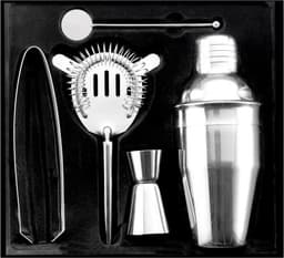 A stainless steel cocktail set featuring a shaker, strainer, jigger, and stirring spoon, all in a polished finish.