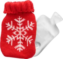 A re-usable hot pad shaped like a warm water bag, featuring a red knitted cover with a snowflake design.