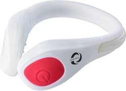 A white and red silicone shoe clip with a smooth, curved design and an accent button, featuring a logo.