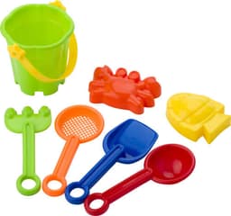A green beach bucket with a yellow handle, accompanied by colourful sand toys: a red crab, blue shovel, green rake, and a red scoop.