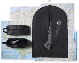 A black PEVA garment bag, accompanied by a small black pouch, laid out on top of maps.